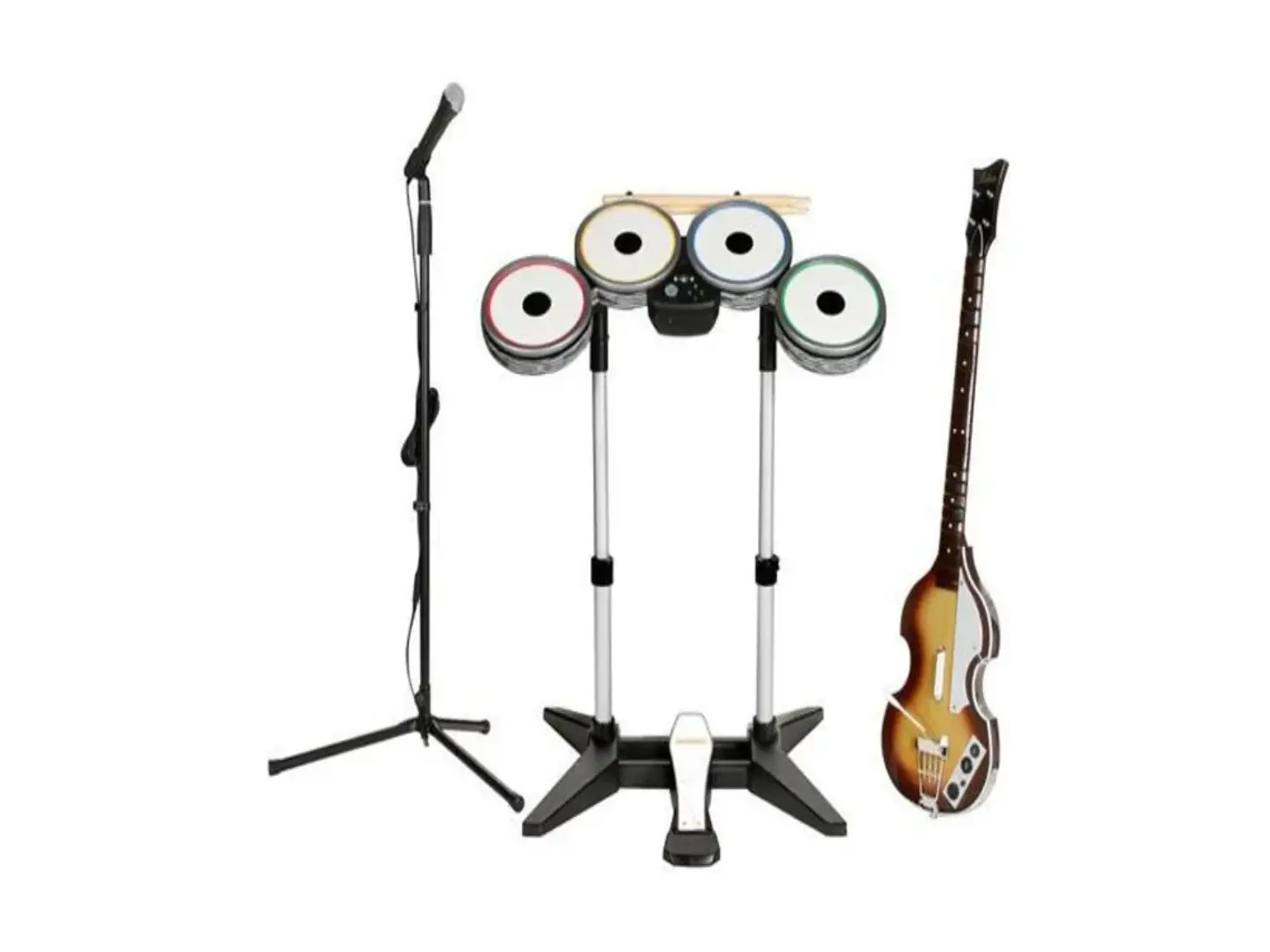 Stanowisko Rock Band i Guitar Hero z instrumentami